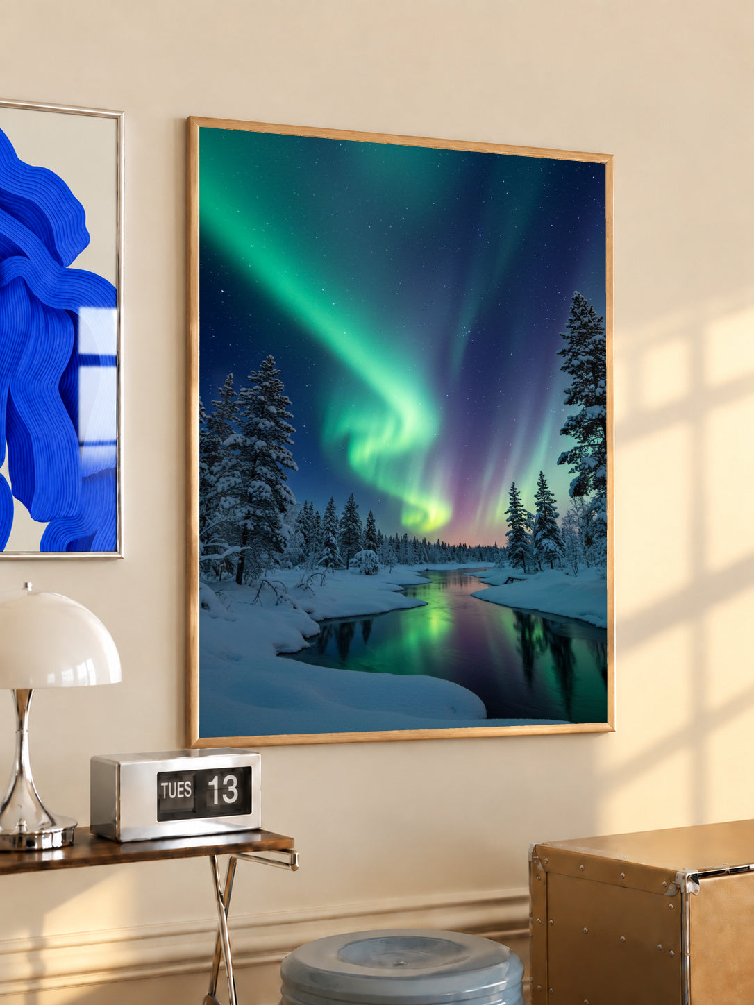 Framed landscape wall art with green aurora over snowy pine forest and river
