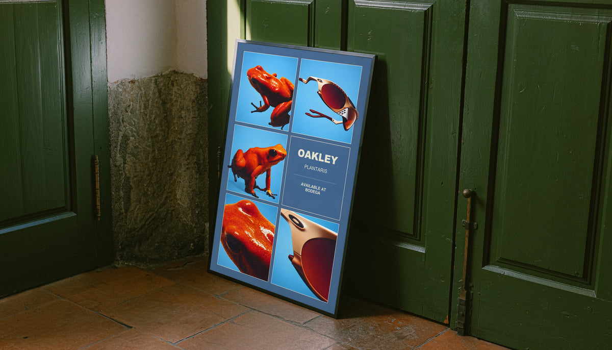 Oakley Plantaris poster in a black frame, featuring a collage of orange frogs and sunglasses.