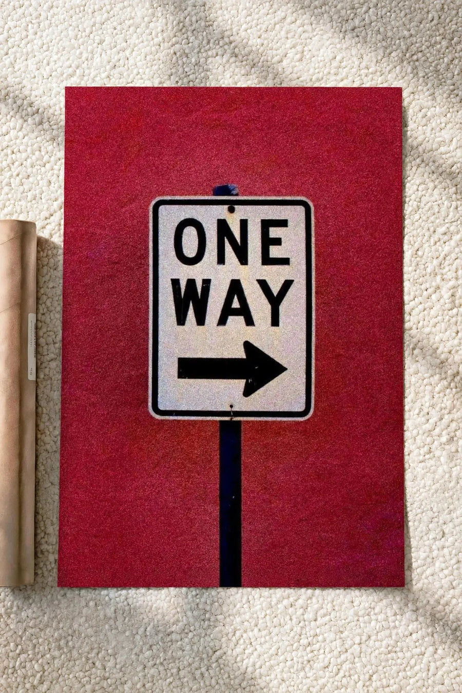 One way poster with red background and sign reading ONE WAY with right arrow