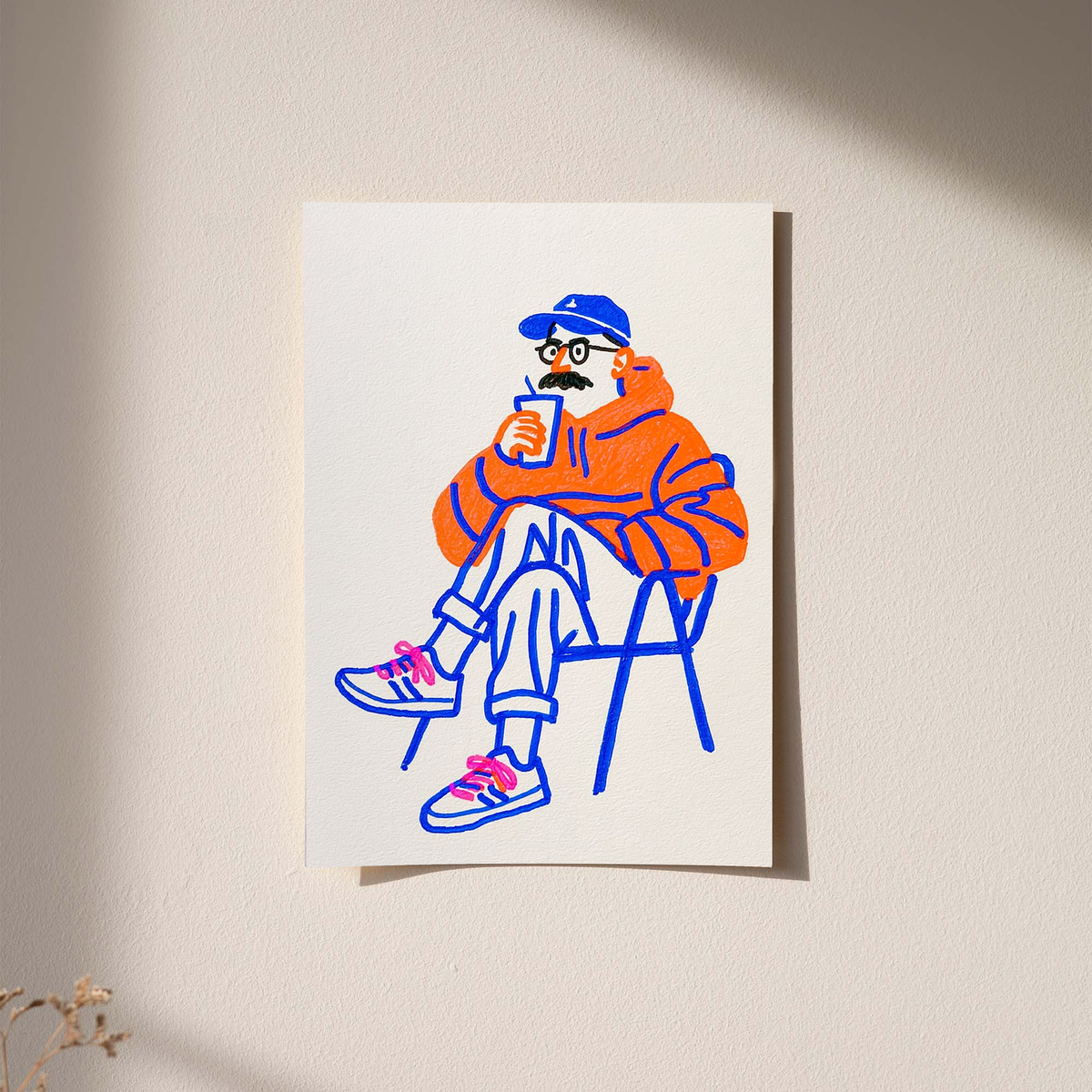 Coffee art print with seated orange character holding a cup, blue linework