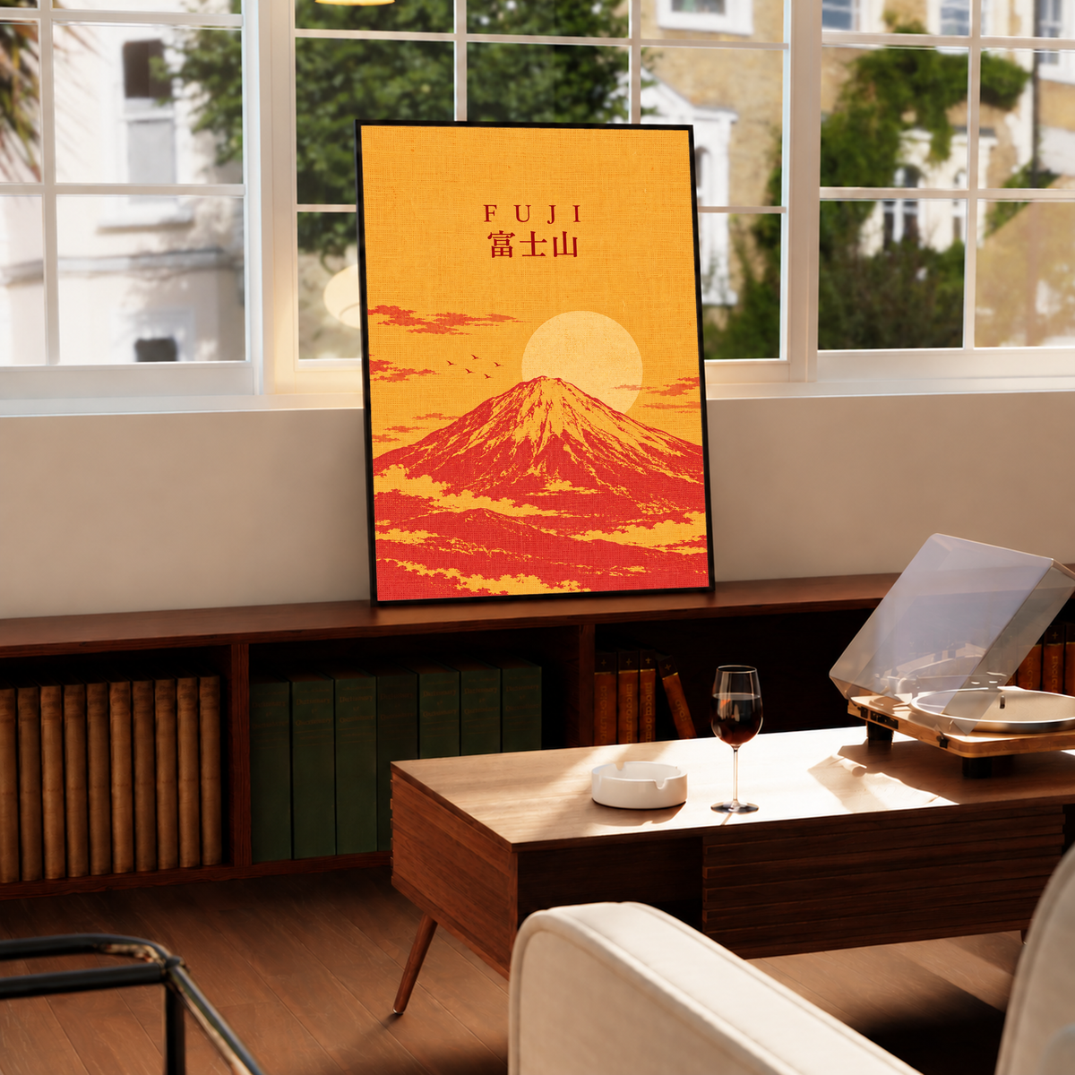 Framed Mount Fuji sunrise print with “FUJI” text, orange sky, and circular sun.