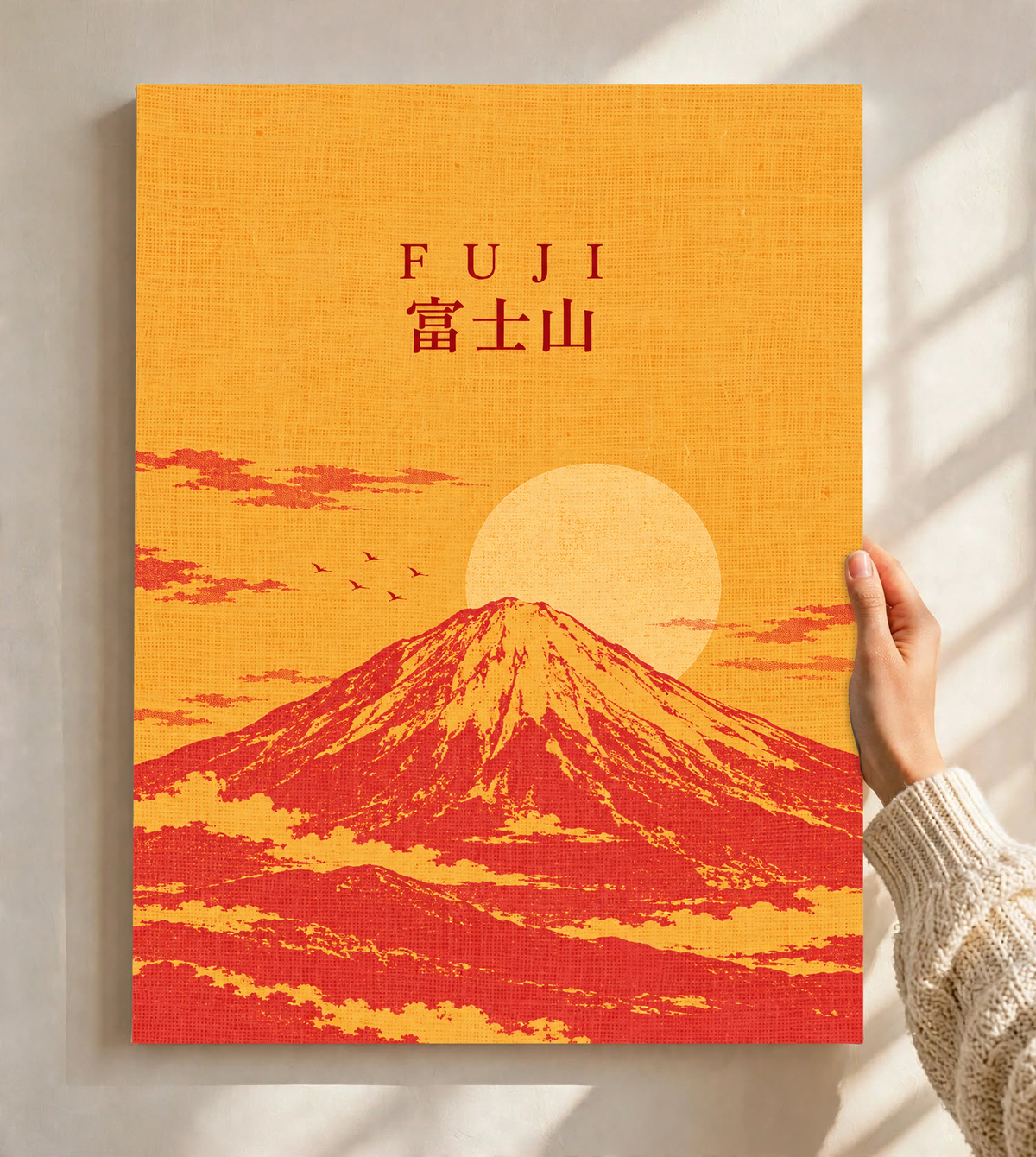 Orange Mount Fuji sunrise artwork poster with “FUJI” title and red mountain.