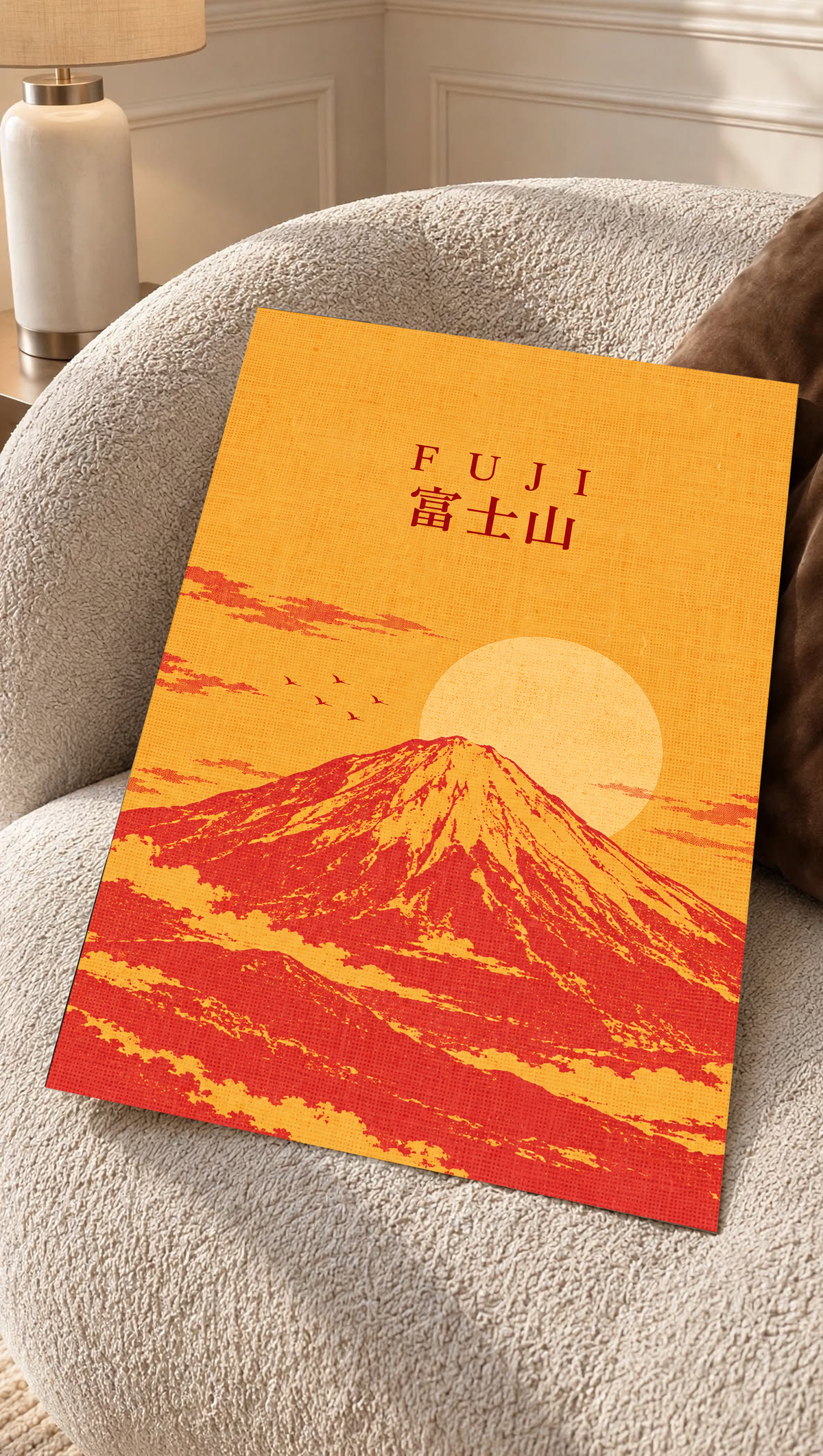 Orange and red Mount Fuji sunrise poster with “FUJI” lettering and circular sun.
