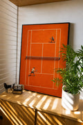 Framed orange tennis court abstract art print with two players and white court lines