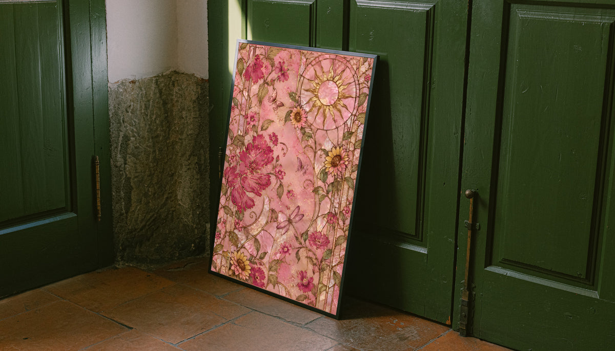 Framed pink floral wall art leaning against dark green doors, with circular medallion
