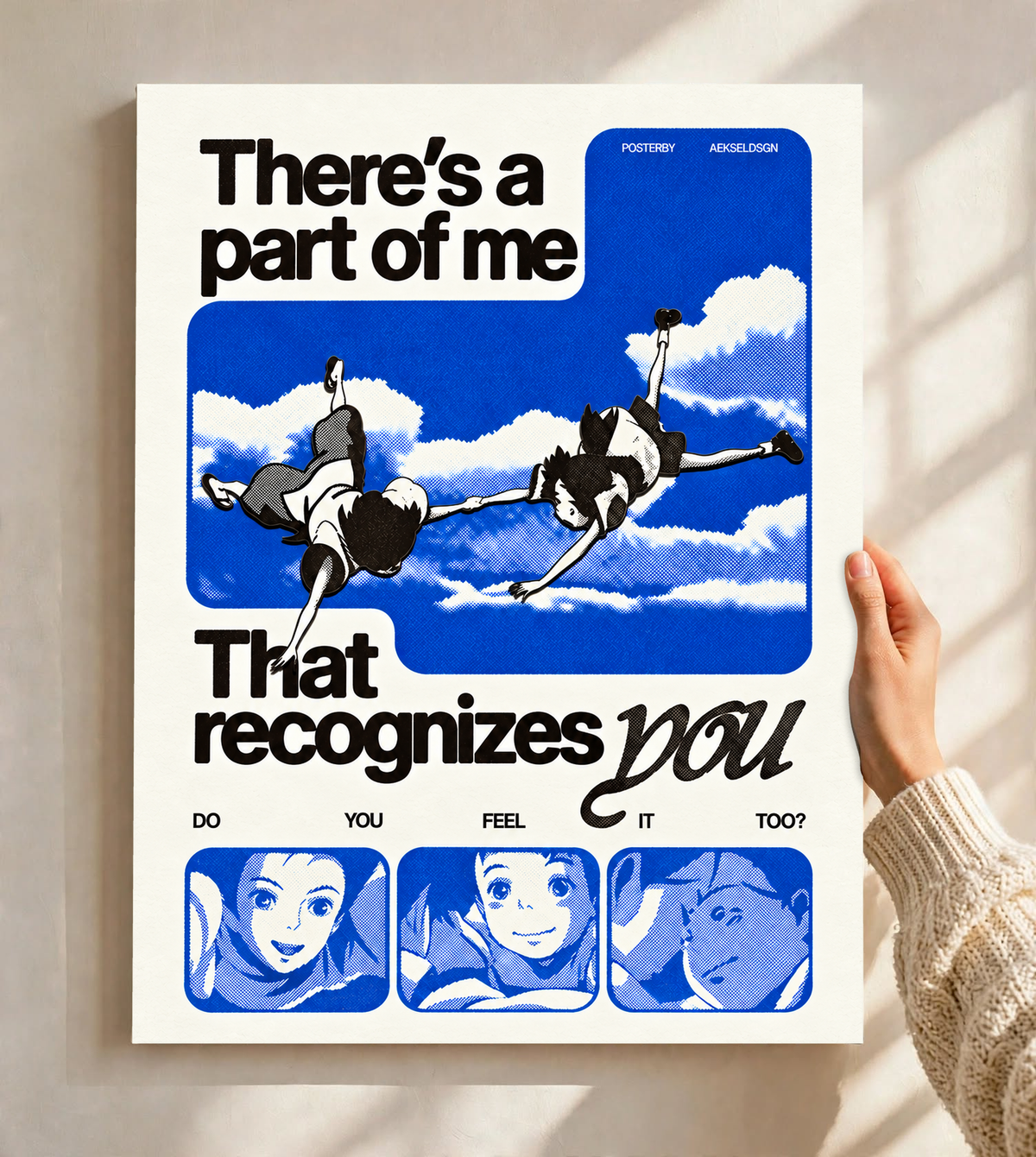 Two anime figures against blue sky with character portraits and a romantic recognition quote as an unframed poster held against a pale sunlit wall