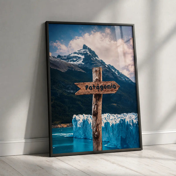 Black-framed travel poster with glacier mountain landscape and wooden Patagonia sign