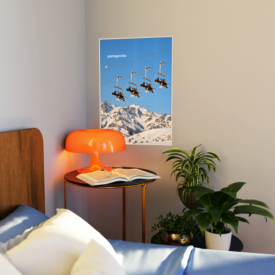 Small framed ski chairlift wall poster showing gondolas, snowy peaks, and blue sky