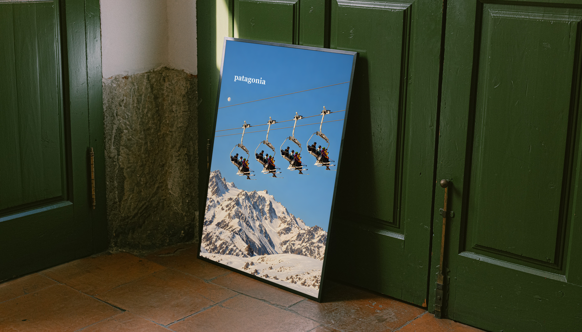 Skiers on chairlifts above snowy mountains beneath a muted blue sky; unframed canvas styled by a green doorway