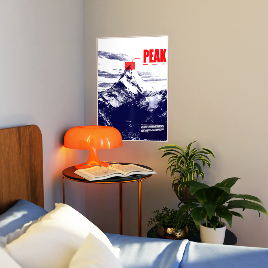 Framed mountain poster with red 'PEAK' lettering and dark blue mountain print.