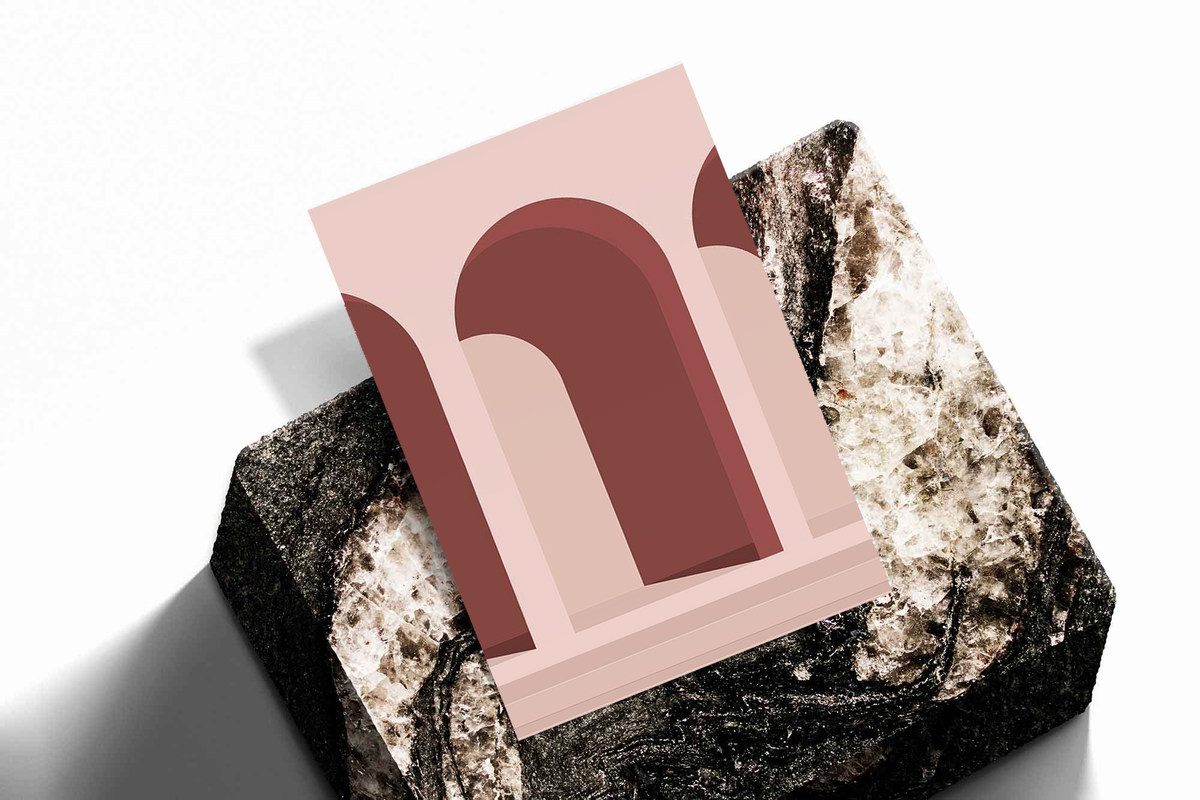 Unframed artwork depicting repeating arches and stair-like forms, presented diagonally on rough stone.