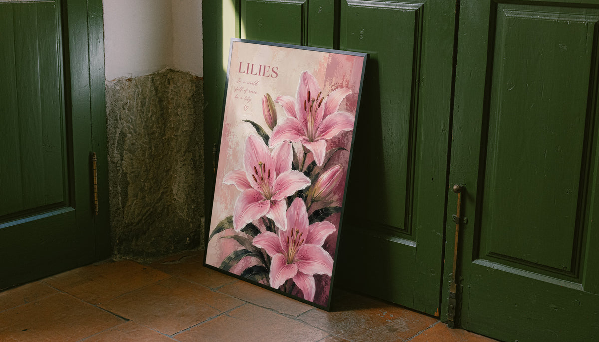 Pink lilies and buds with dark green leaves beneath a LILIES heading on a soft blush ground leaning on the floor against dark green wall panelling
