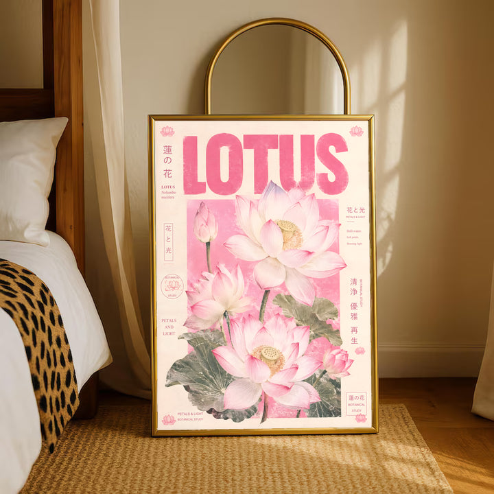 Pink lotus botanical poster in a gold frame on the floor with LOTUS typography and blooms