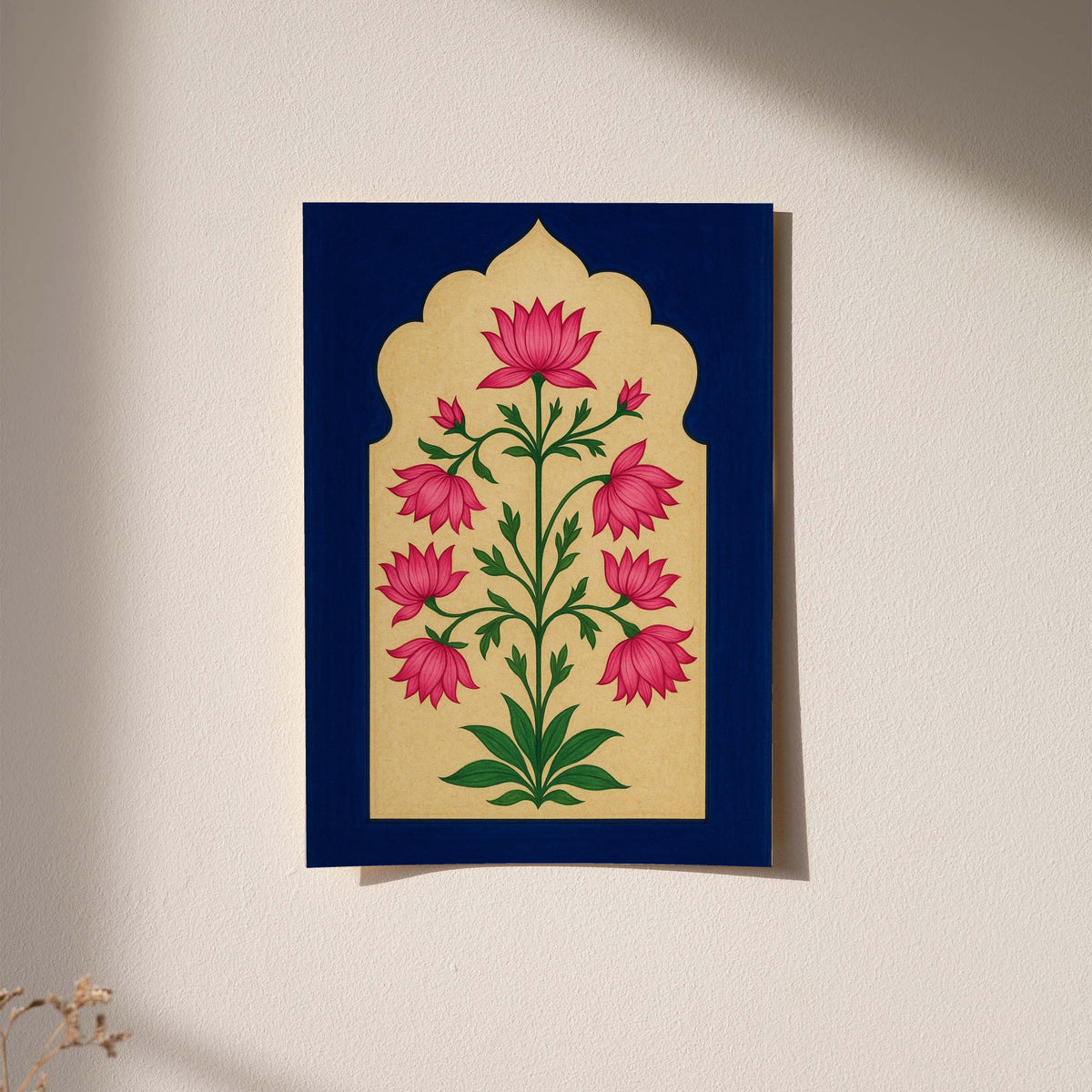 Pink lotus-like flowers and green stems within a scalloped gold arch on navy blue displayed without a visible frame on a softly lit pale wall