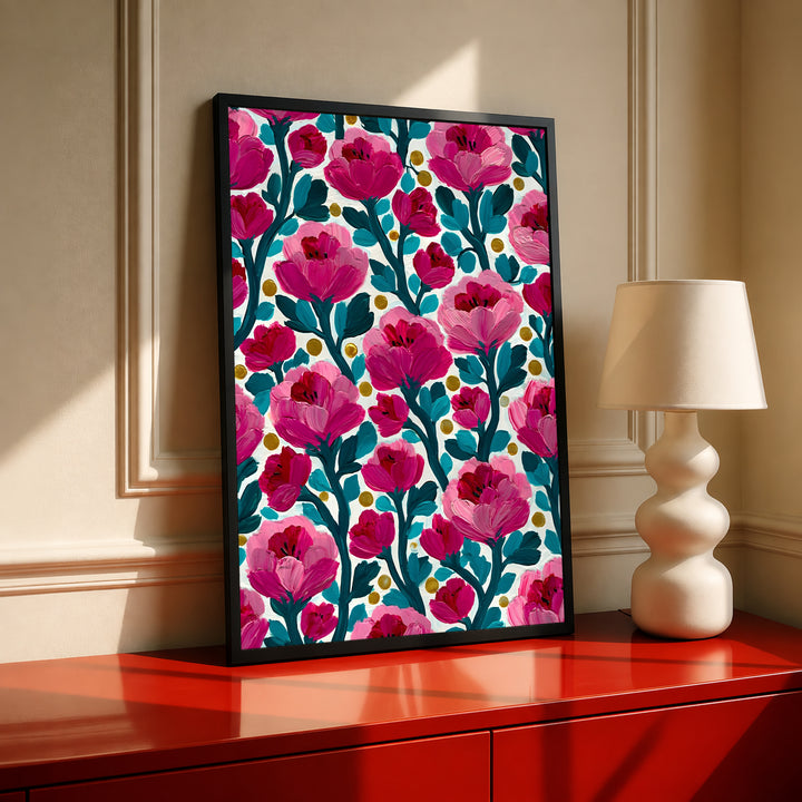 Framed floral wall art print with pink blossoms, teal stems, cream ground, yellow dots