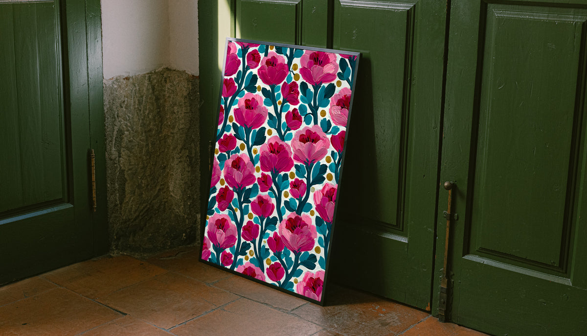 Framed floral wall art print with pink blossoms, teal stems, cream ground, and yellow dots