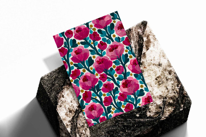Floral wall art print with pink flowers, teal stems, cream background, and yellow dot accents