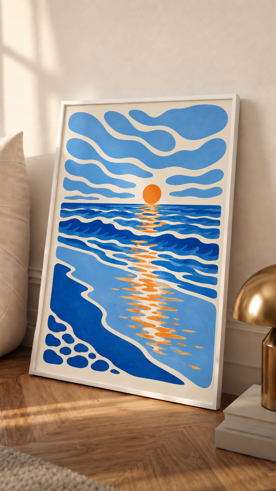 White-framed coastal wall art print with blue wave lines and orange sun at horizon