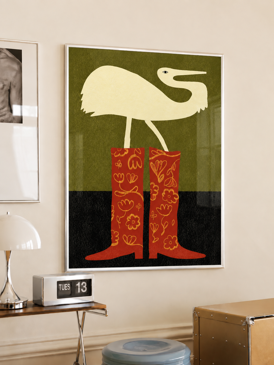 Framed crane and cowboy boots wall art print with cream bird and red patterned boots