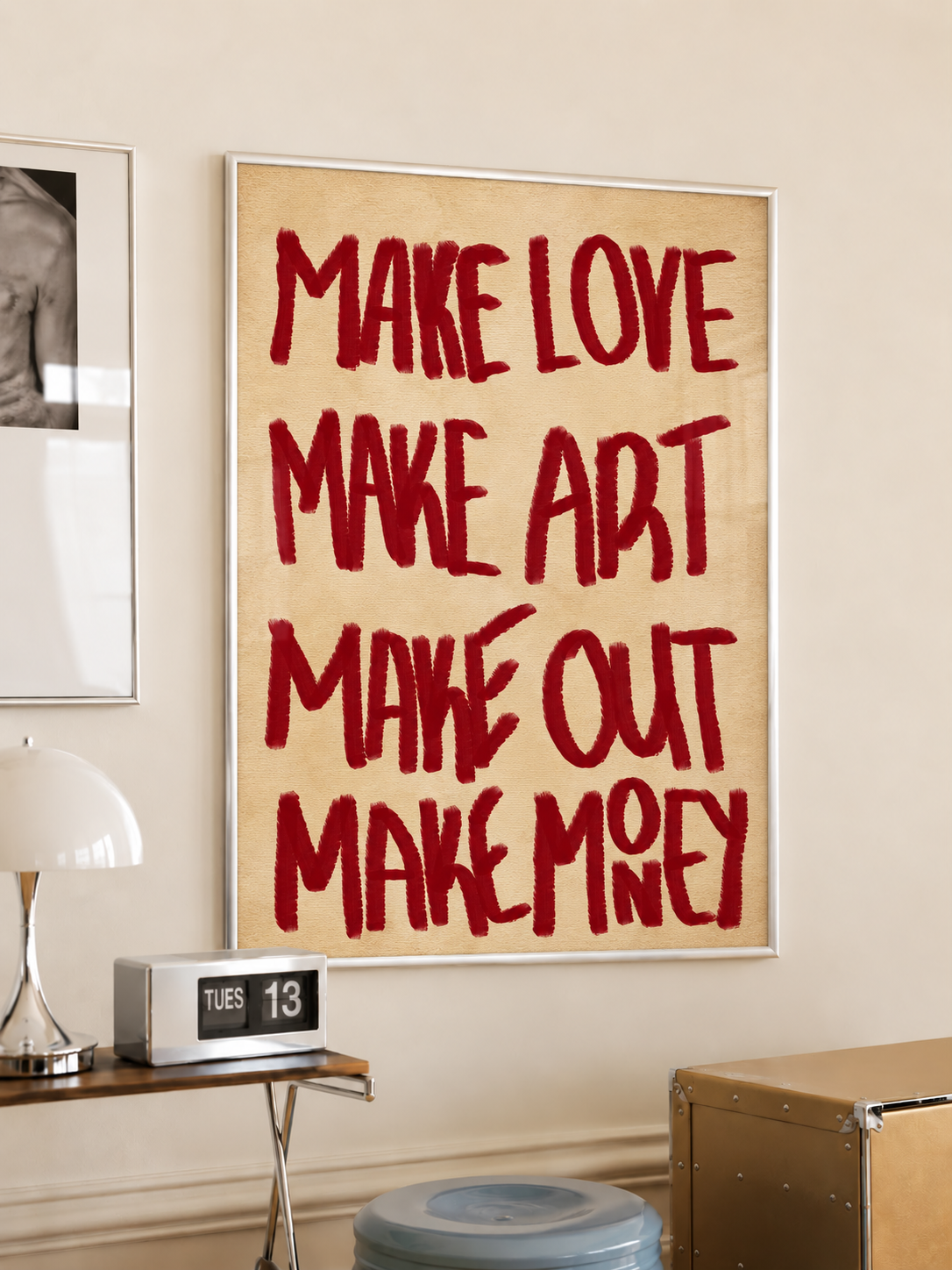 Framed typography wall art with red text: MAKE LOVE, MAKE ART, MAKE OUT, MAKE MONEY