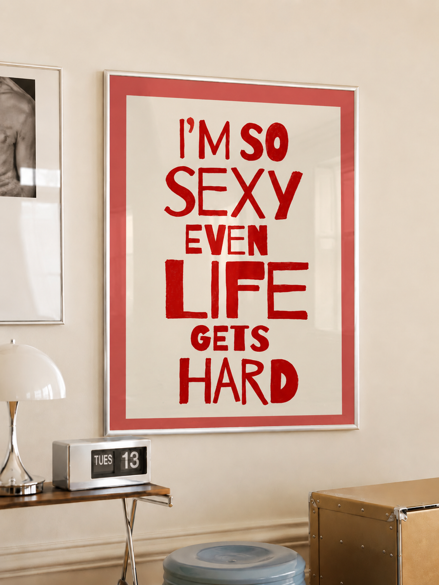 Framed typography wall art with red quote 'I’M SO SEXY EVEN LIFE GETS HARD'