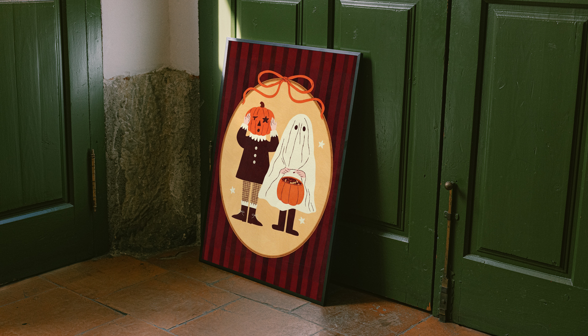 Framed Halloween poster with pumpkin-head figure and ghost on red vertical stripes
