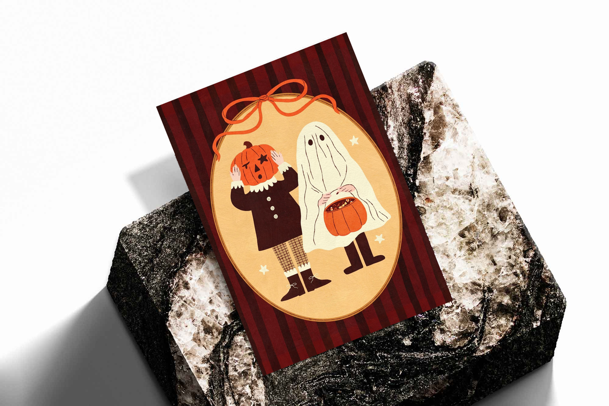 Halloween poster print with pumpkin-head and ghost characters on red striped oval, tied with bow
