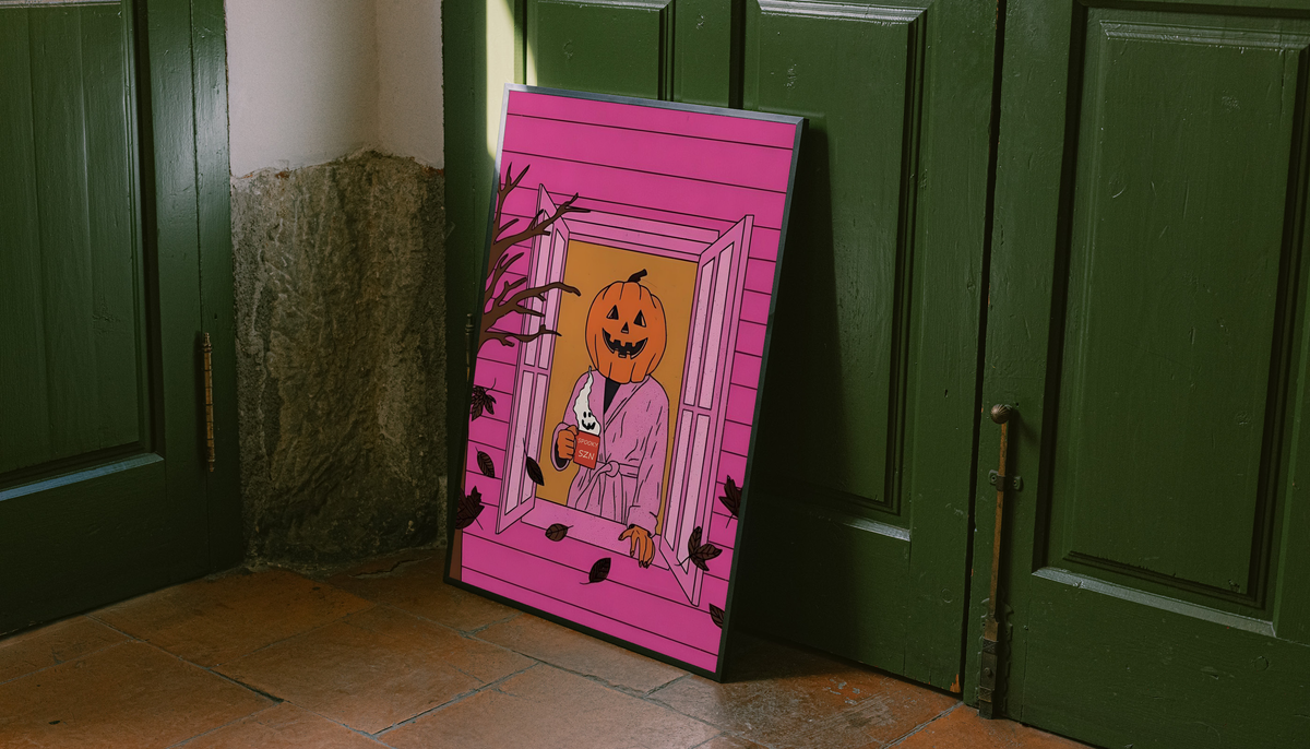 Halloween poster with black frame leaning against green doors, jack-o'-lantern bathrobe graphic