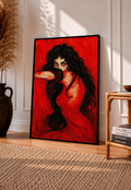 Framed portrait print of a woman with long black hair on a red background