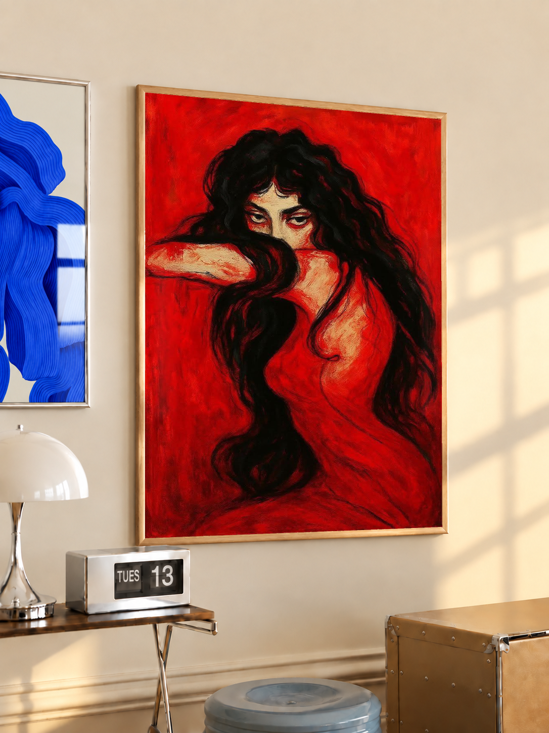 Framed portrait print featuring a long-haired woman in red with one arm extended
