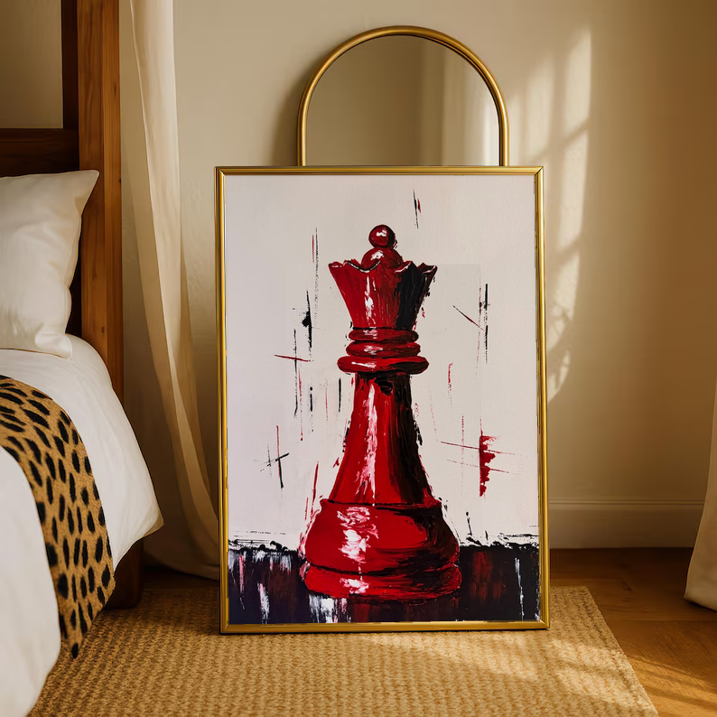 Gold-framed red chess queen print with expressive brush strokes on a light background.