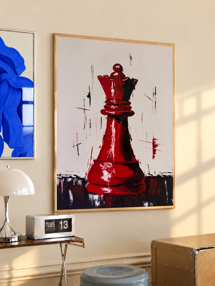 Light-wood framed red chess queen print with expressive brush strokes on a light background.