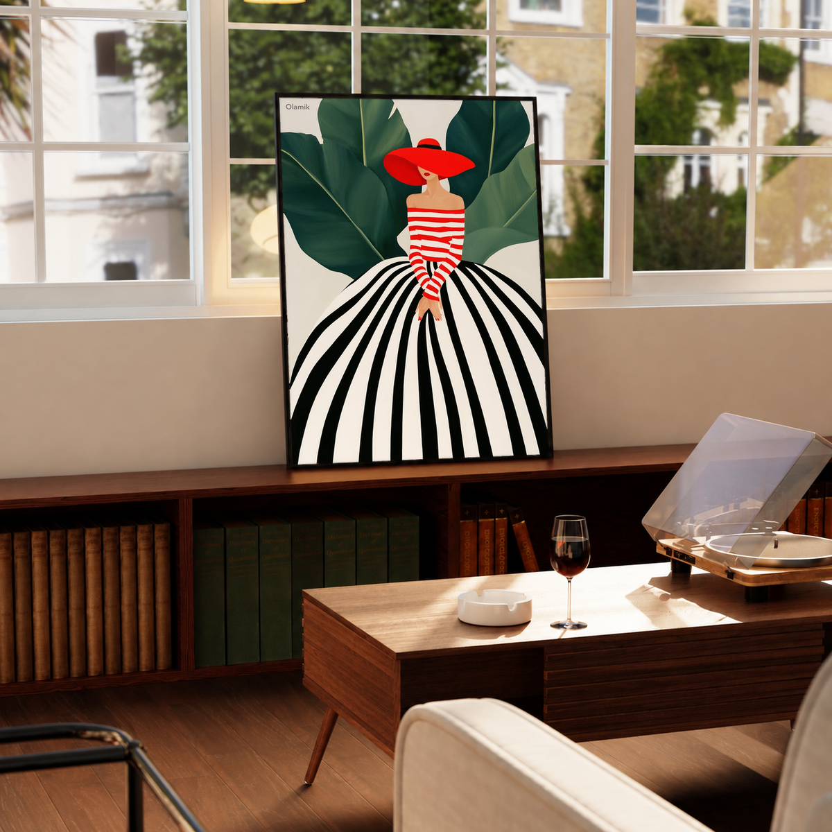 Framed red-hat woman portrait art print with striped dress and green leaf shapes, black frame.