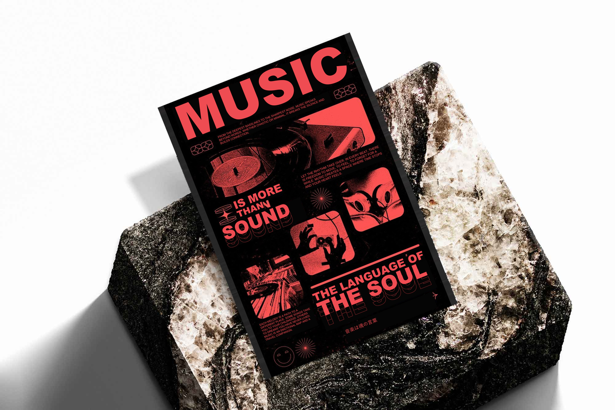Music typography and listening equipment as an unframed print propped against a pale wall on a rough stone