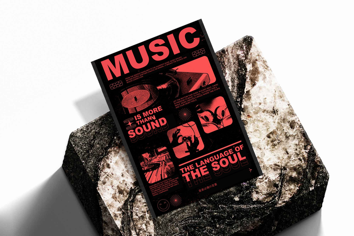 Music typography and listening equipment as an unframed print propped against a pale wall on a rough stone