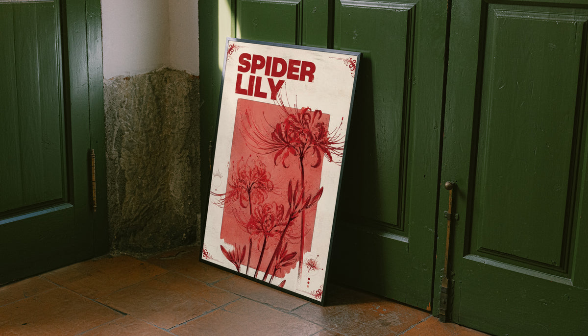 Red spider lily flowers and the words SPIDER LILY in a vintage cream and red botanical design leaning on the floor against dark green wall panelling