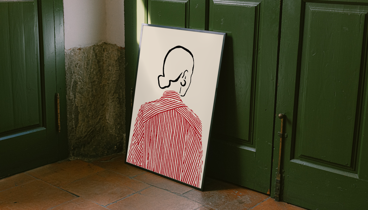 Framed back-view shirt line art print in black frame with red striped shirt