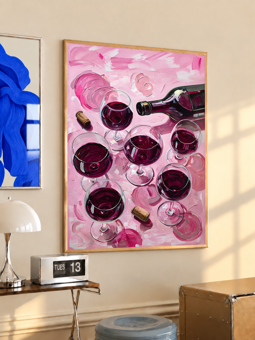 Black-framed wine glass and bottle art print with pink tones