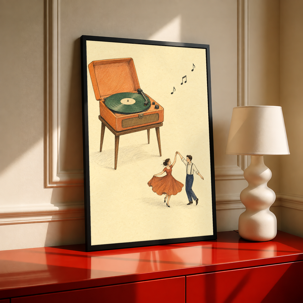 Black-framed print showing a retro record player and a dancing couple with music notes