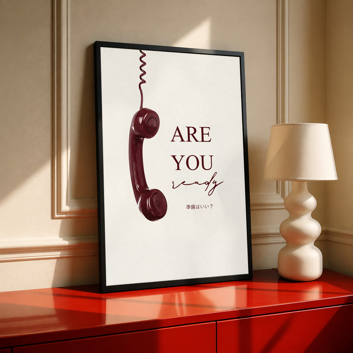 Black-framed telephone typography poster with burgundy 'ARE YOU' on cream