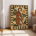 Tiger botanical wall art in wooden frame with orange stripes and green leaves