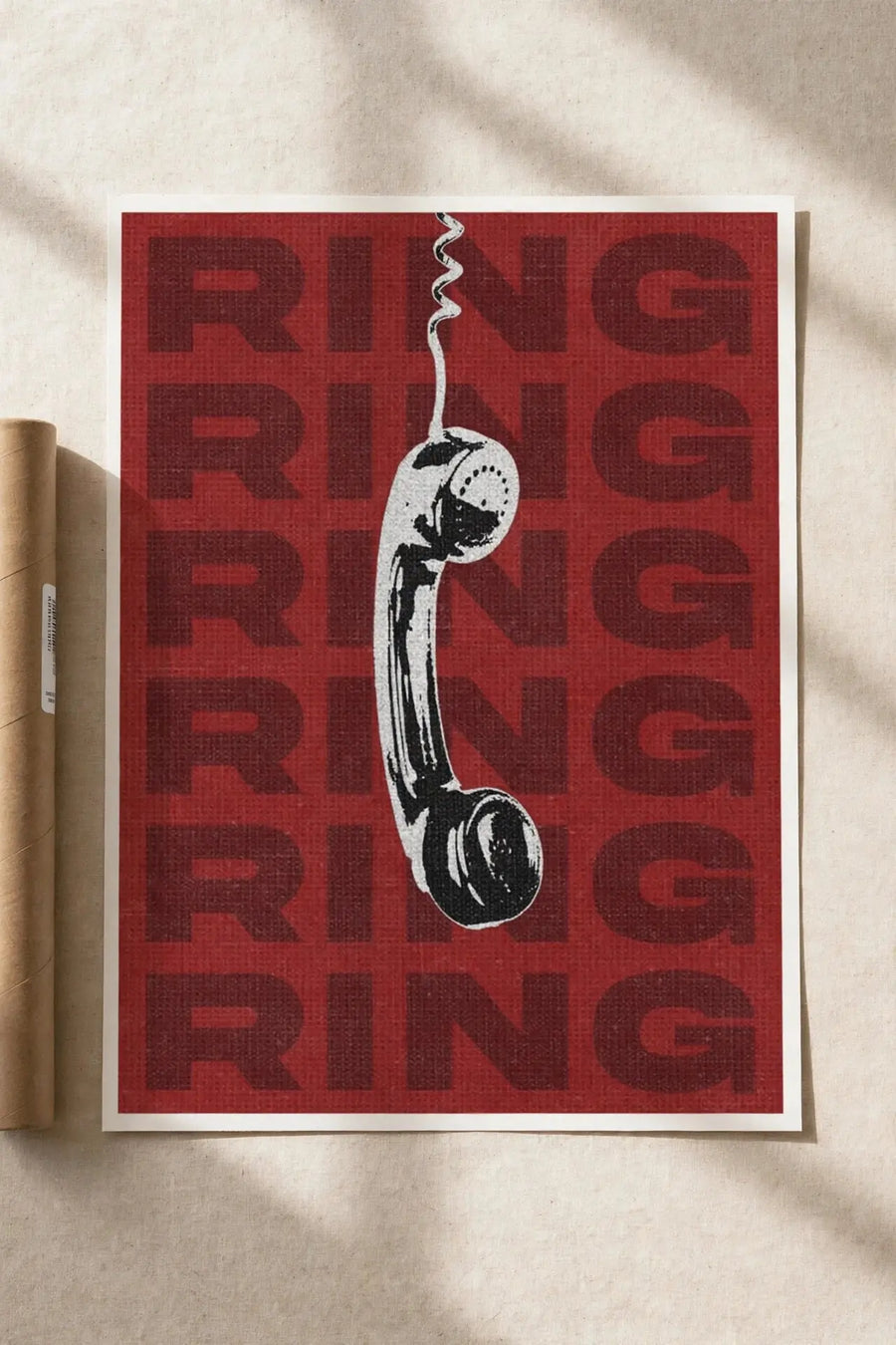 Red telephone print with white handset and repeating RING RING typography, bordered poster