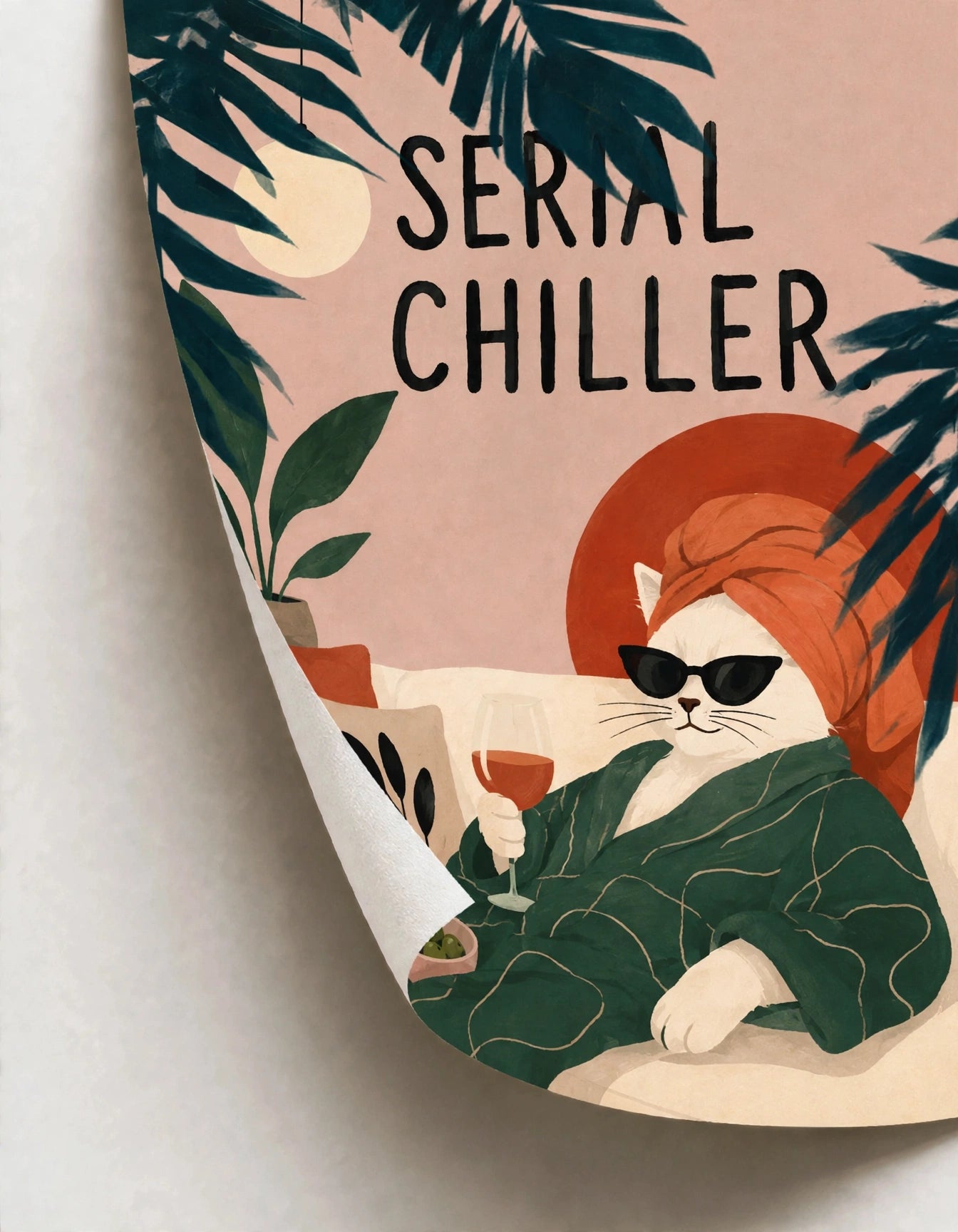 Rolled cat art poster showing orange cat, green foliage, and “Serial Chiller” headline