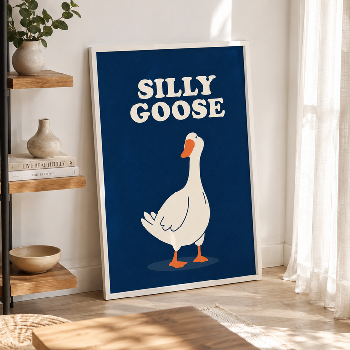 Framed wall art poster with cartoon goose and "SILLY GOOSE" text on blue background