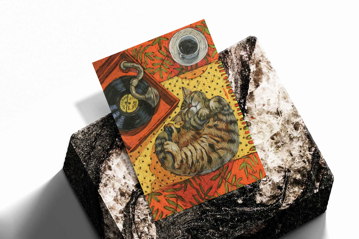Cat sleeping on vinyl art print (unframed), warm orange collage on textured stone