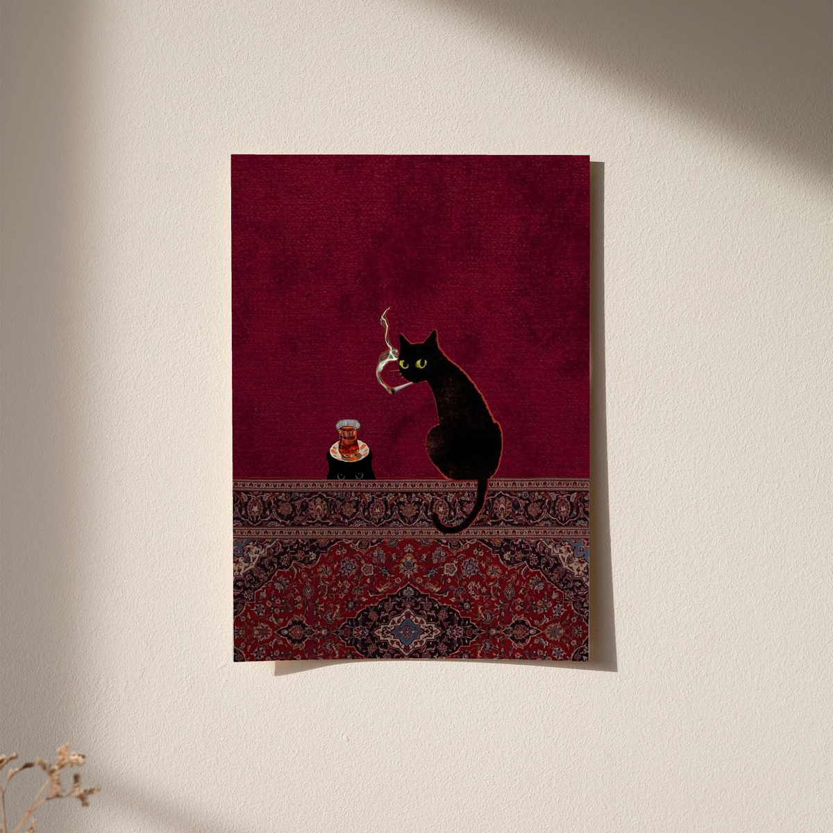 Black cats, tea glass and smoking motif as an unframed print against a pale plaster wall with soft shadows