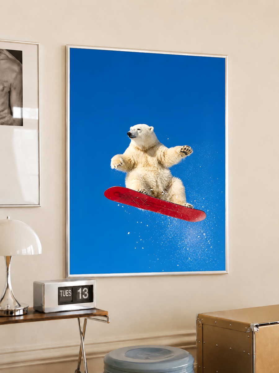 Blue snowboarding polar bear wall poster with red snowboard and falling snow specks