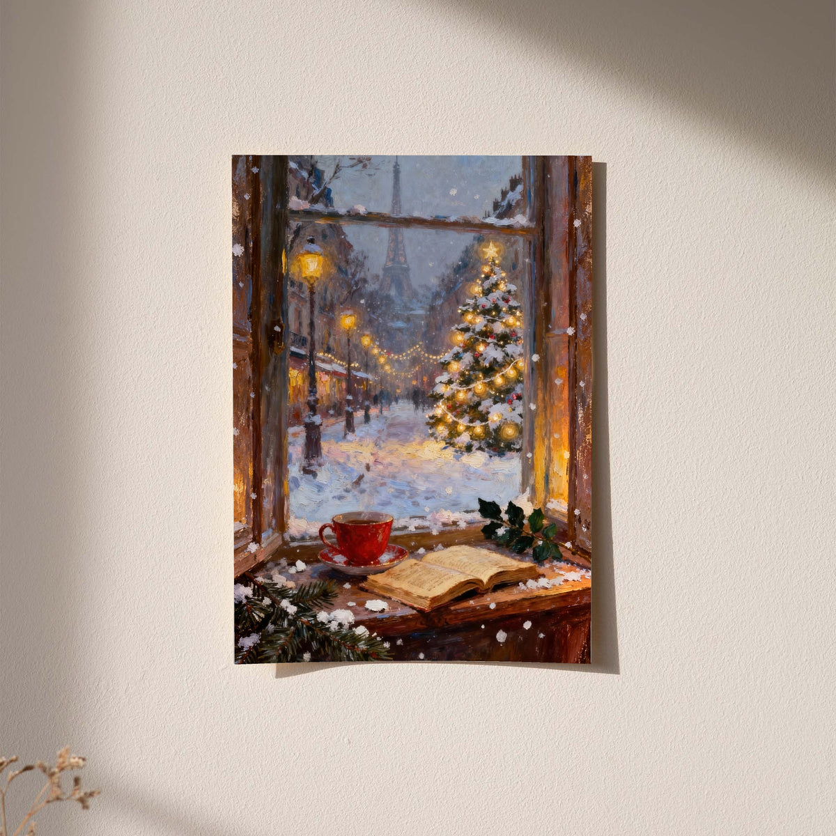 Framed winter Paris window art print on wall with glowing Christmas tree and snowy scene