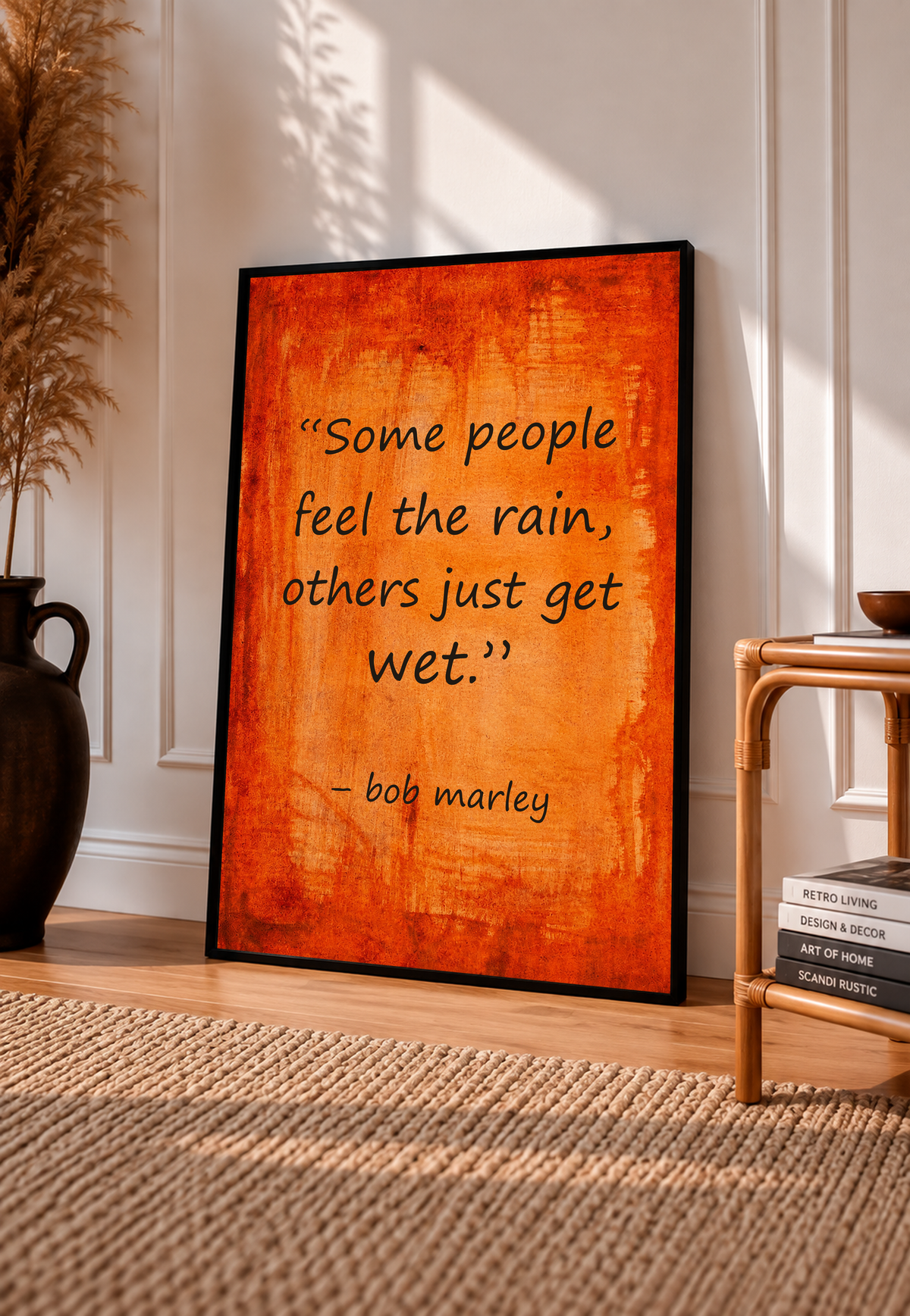 Framed quote poster on textured orange background with “Some people feel the rain”
