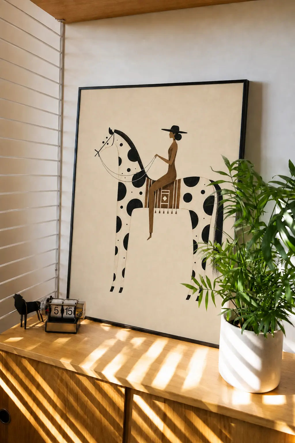 Framed minimal art print: spotted horse and rider, black-and-white illustration